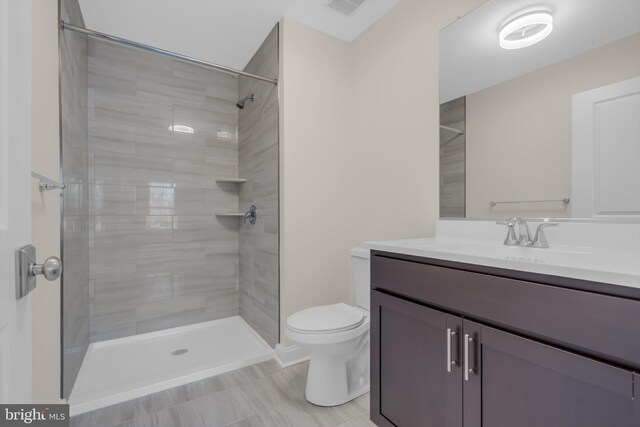 14 Mill Creek Ct, Bayville, NJ 08721 - bathroom featuring vanity, toilet, and a tile shower