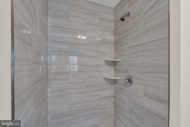 details with a tile shower