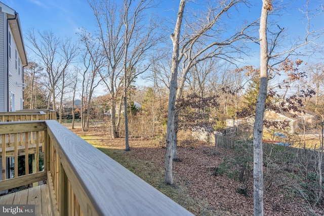 view of yard with a balcony