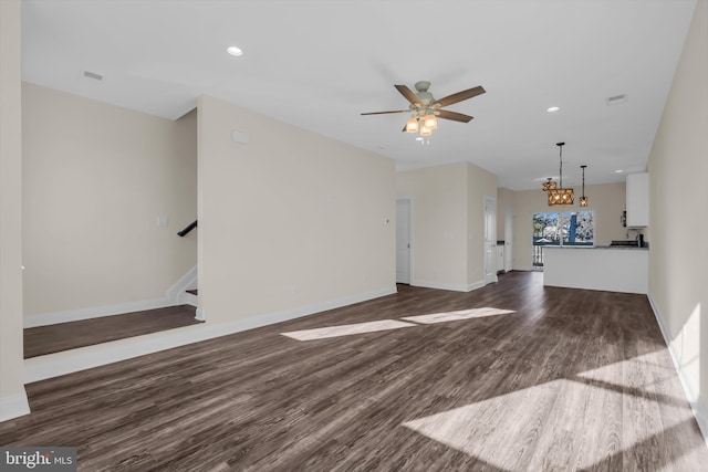 14 Mill Creek Ct, Bayville, NJ 08721 - unfurnished living room with dark wood-style floors, a chandelier, ceiling fan, baseboards, and recessed lighting