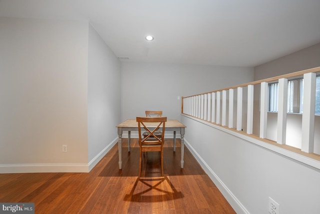 dining room with wood-type flooring