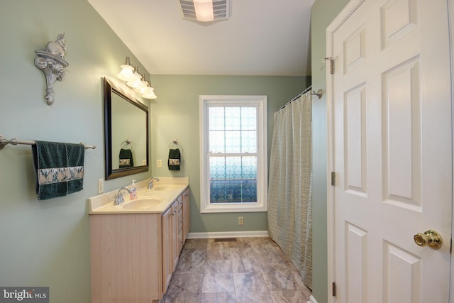 bathroom featuring vanity