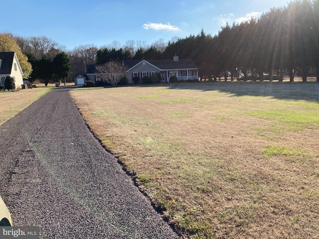 view of front of home featuring a front lawn