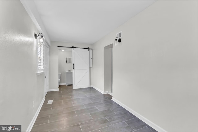 hallway with a barn door