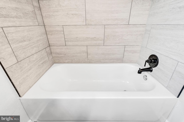 bathroom featuring a tub