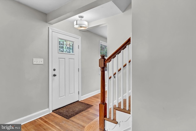 foyer entrance with light hardwood / wood-style flooring