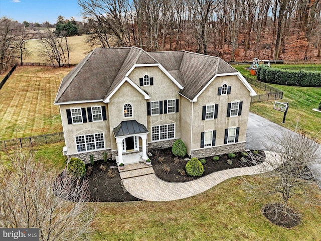 view of front of home with a front lawn