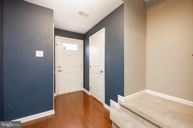 foyer featuring wood-type flooring