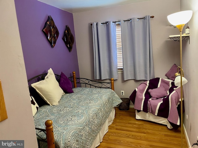 bedroom featuring light hardwood / wood-style floors