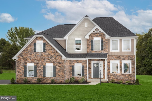 craftsman-style house featuring a front yard