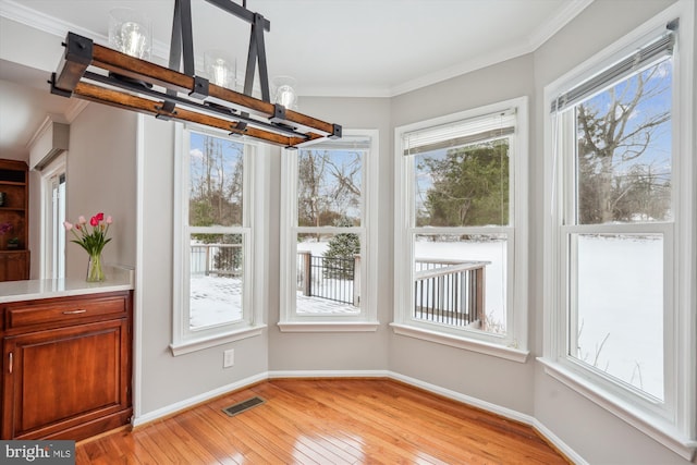 unfurnished sunroom with plenty of natural light