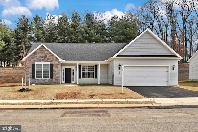 single story home featuring a garage