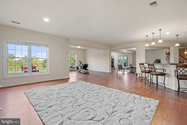 interior space with hardwood / wood-style floors