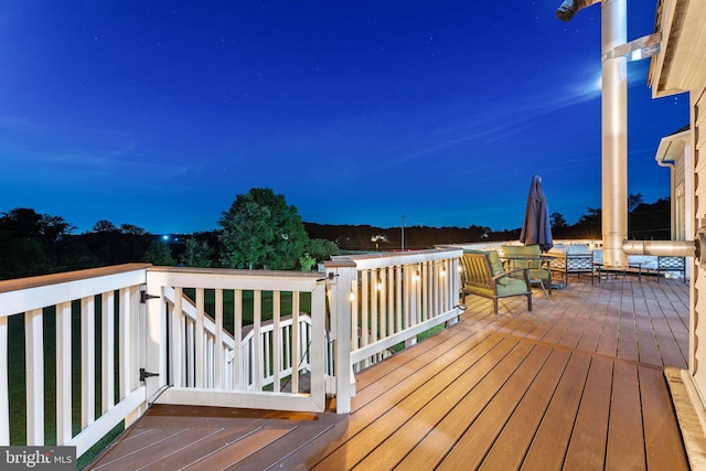 view of deck at dusk