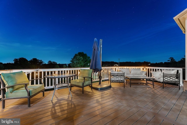 deck with outdoor lounge area