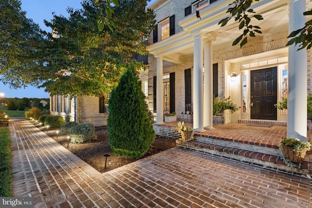 entrance to property with a porch