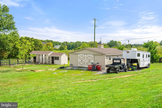 view of yard featuring a storage unit