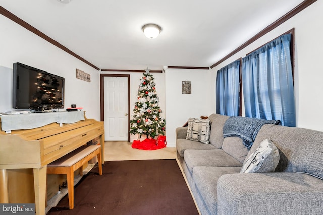 living area featuring dark carpet and crown molding