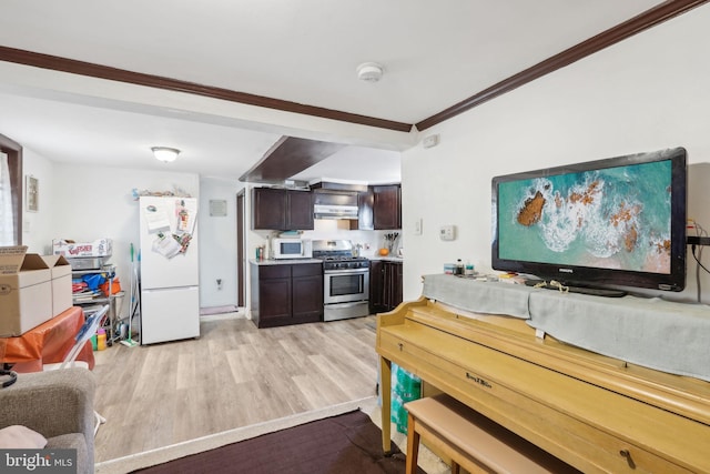 kitchen with ornamental molding, dark brown cabinets, white appliances, and light wood-type flooring