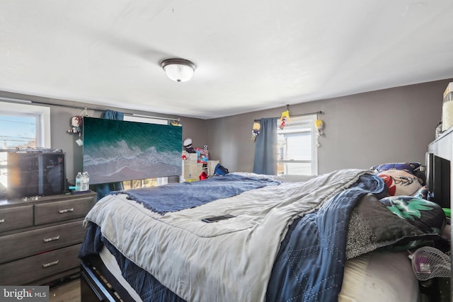 bedroom with wood finished floors