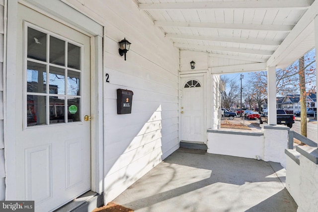 property entrance with a porch