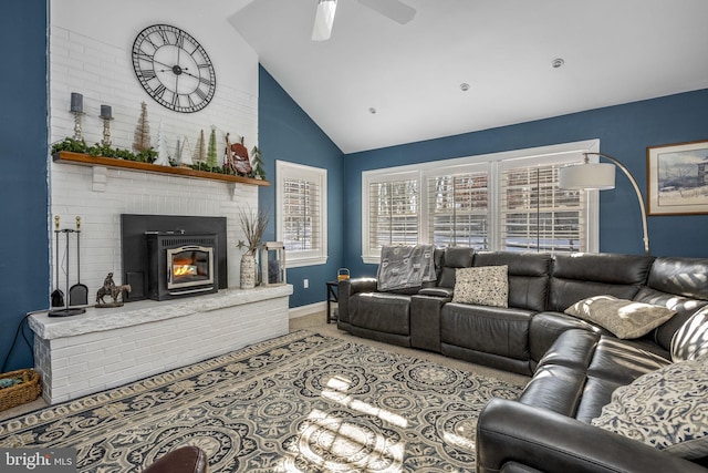 living room with lofted ceiling, a fireplace, and ceiling fan