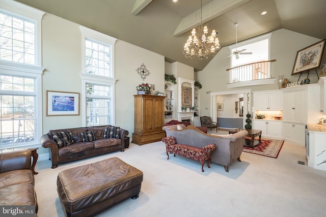 living room featuring beamed ceiling, ceiling fan with notable chandelier, light carpet, and high vaulted ceiling