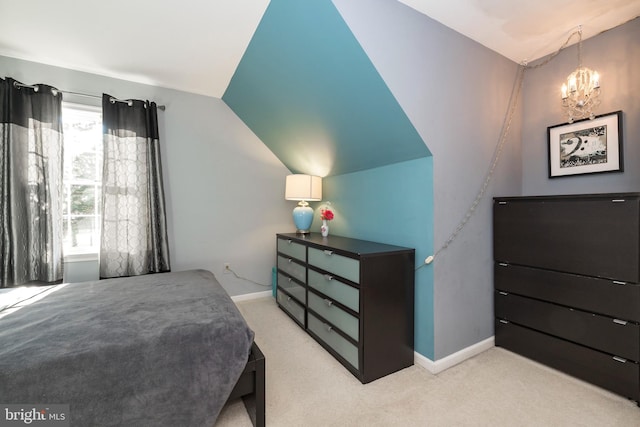 bedroom featuring light carpet, a chandelier, multiple windows, and lofted ceiling