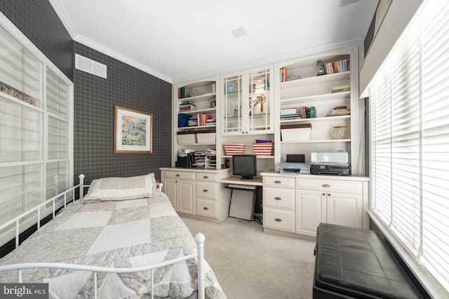 carpeted bedroom with crown molding