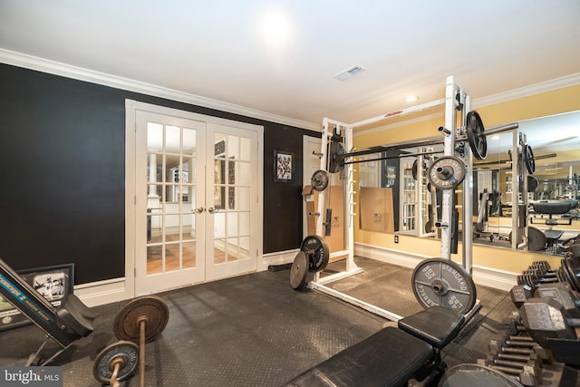 exercise area featuring crown molding and french doors