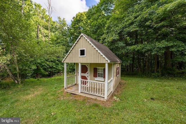 view of outdoor structure with a lawn