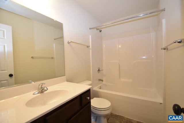 full bathroom featuring vanity, toilet, lofted ceiling, and bathing tub / shower combination