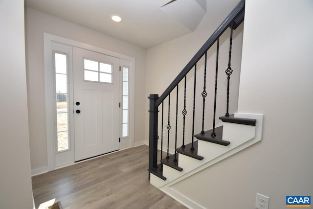 entryway with light hardwood / wood-style flooring