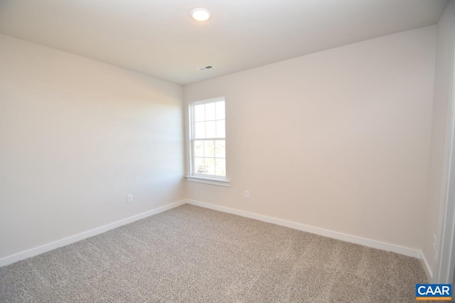 spare room with carpet