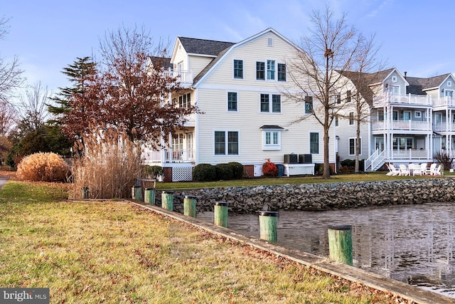 exterior space with a water view