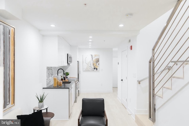 hallway featuring sink