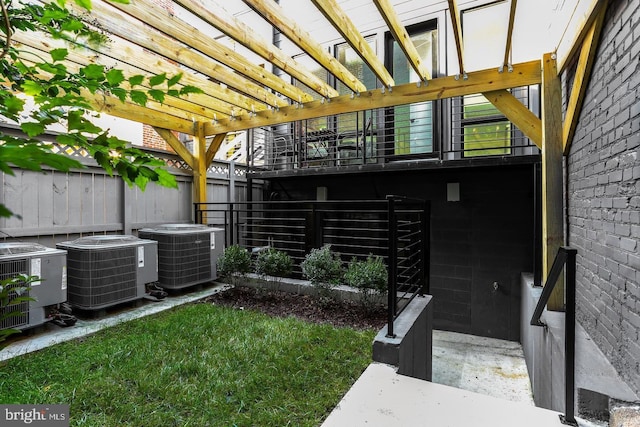 view of yard featuring a pergola and central air condition unit