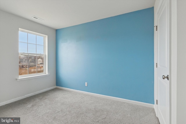 view of carpeted spare room