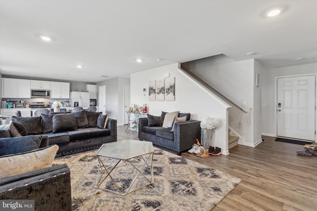 living room with hardwood / wood-style flooring