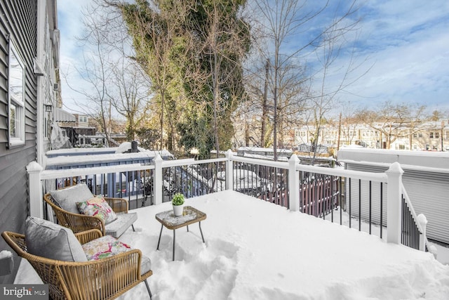 view of snow covered deck