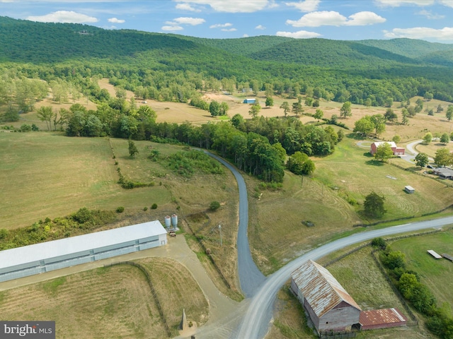 bird's eye view featuring a mountain view and a rural view