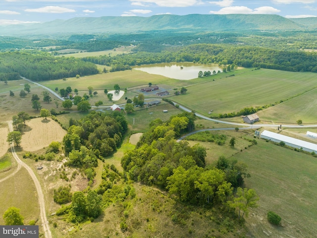 drone / aerial view with a rural view and a water and mountain view