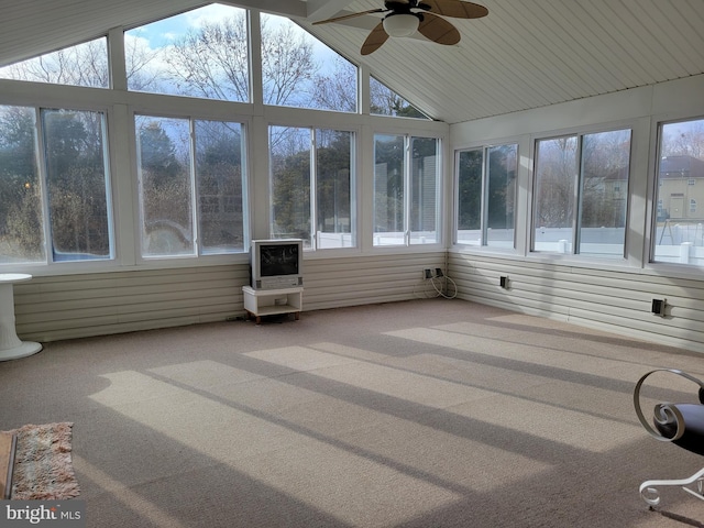 unfurnished sunroom featuring vaulted ceiling and ceiling fan