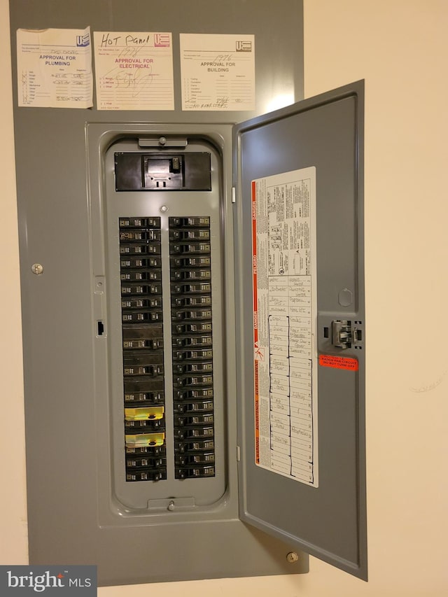 utility room featuring electric panel