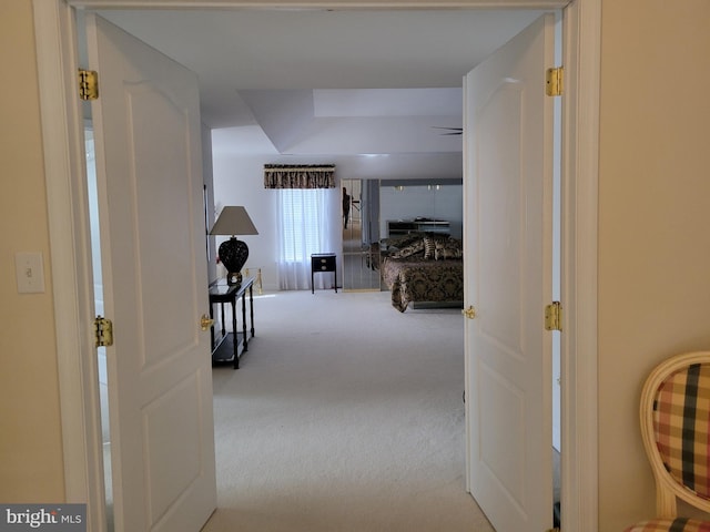 corridor with carpet floors