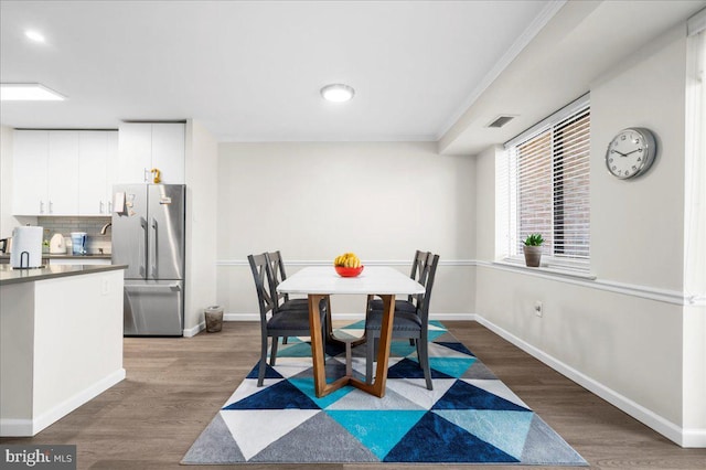 dining room featuring dark hardwood / wood-style floors