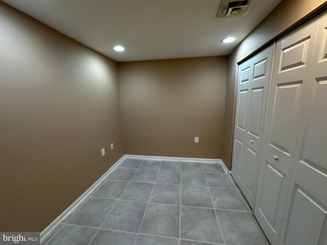 interior space featuring light tile patterned floors