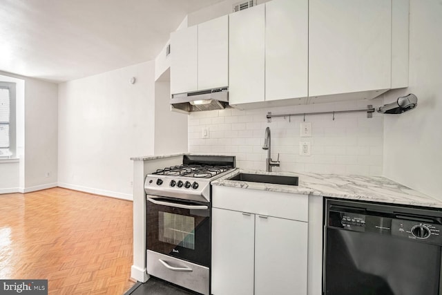 kitchen featuring sink, stainless steel gas range, black dishwasher, range hood, and white cabinetry