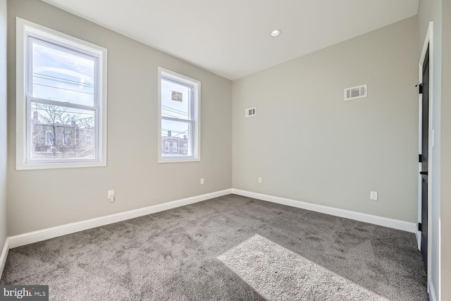 spare room with carpet flooring