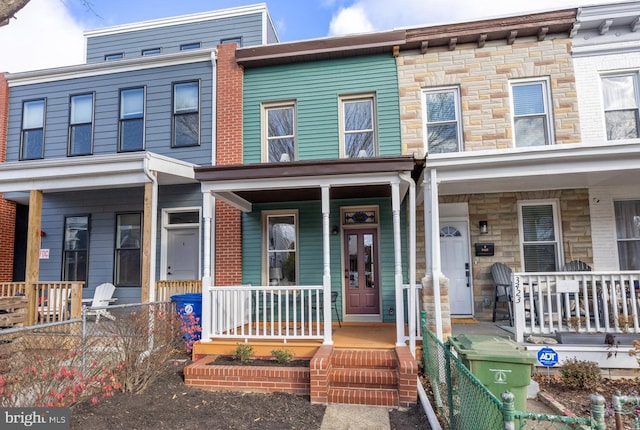 view of property with a porch